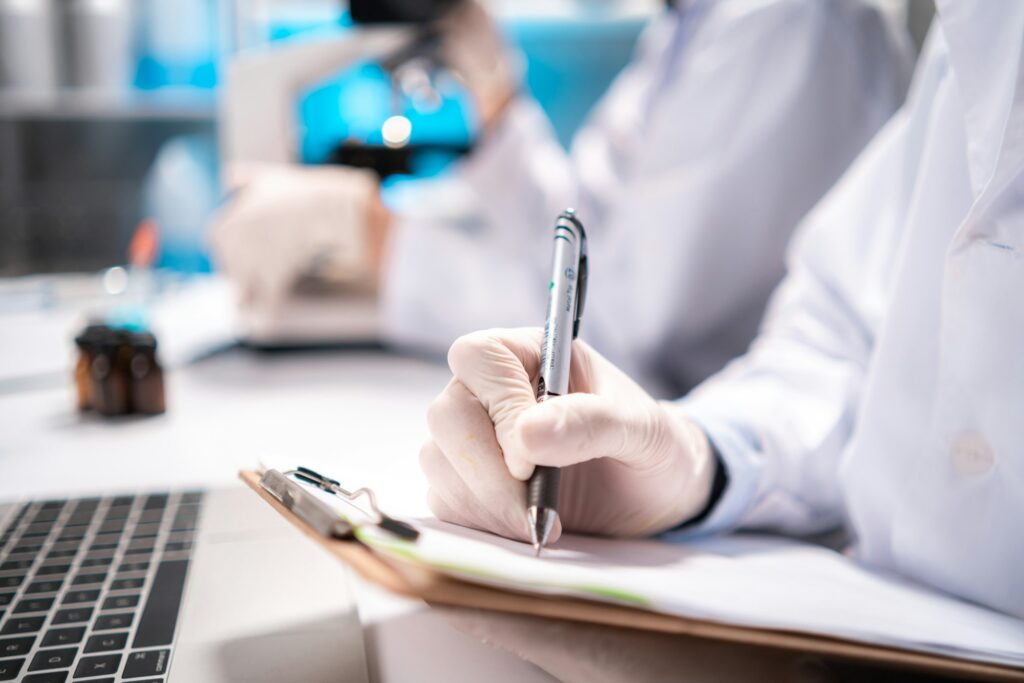 Health care researchers working in life science laboratory, medical science technology research