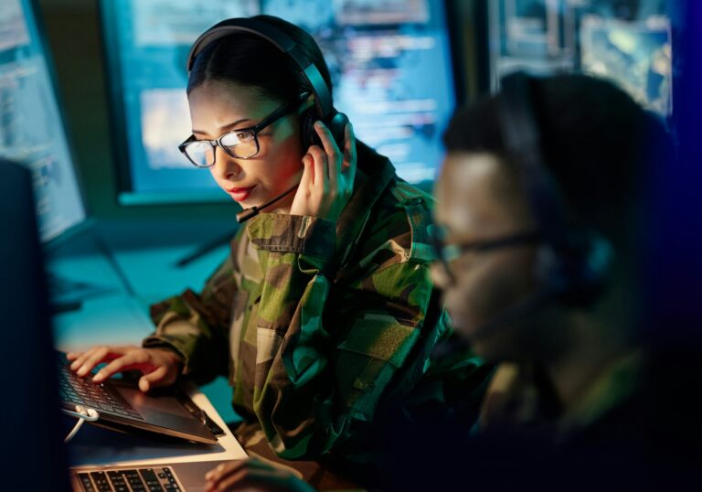 Military control room, headset and woman with communication, computer and technology. Security, glo