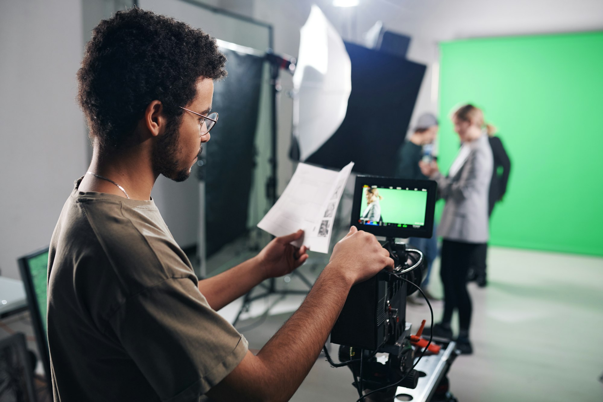 Operator reading script before shooting