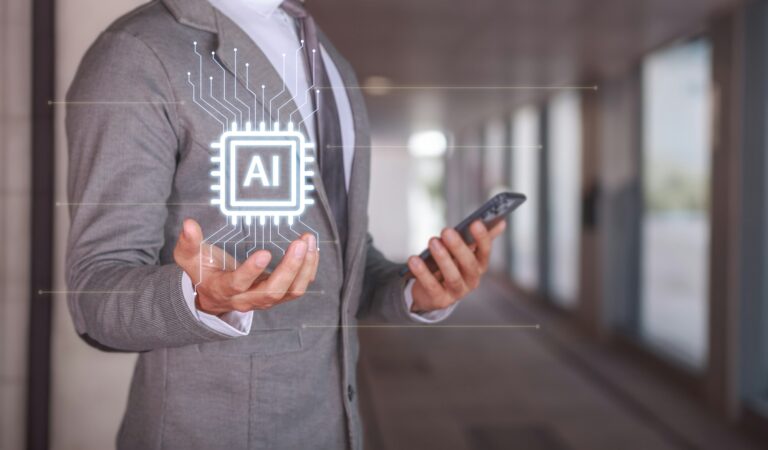 Businessman Holding Smartphone with AI Technology Concept in Modern Office