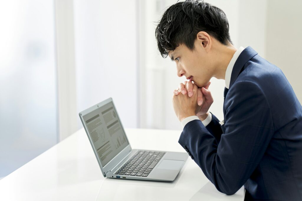 Businessman thinking about business improvement