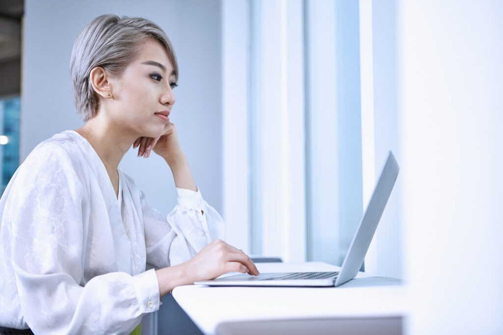 Businesswoman using laptop