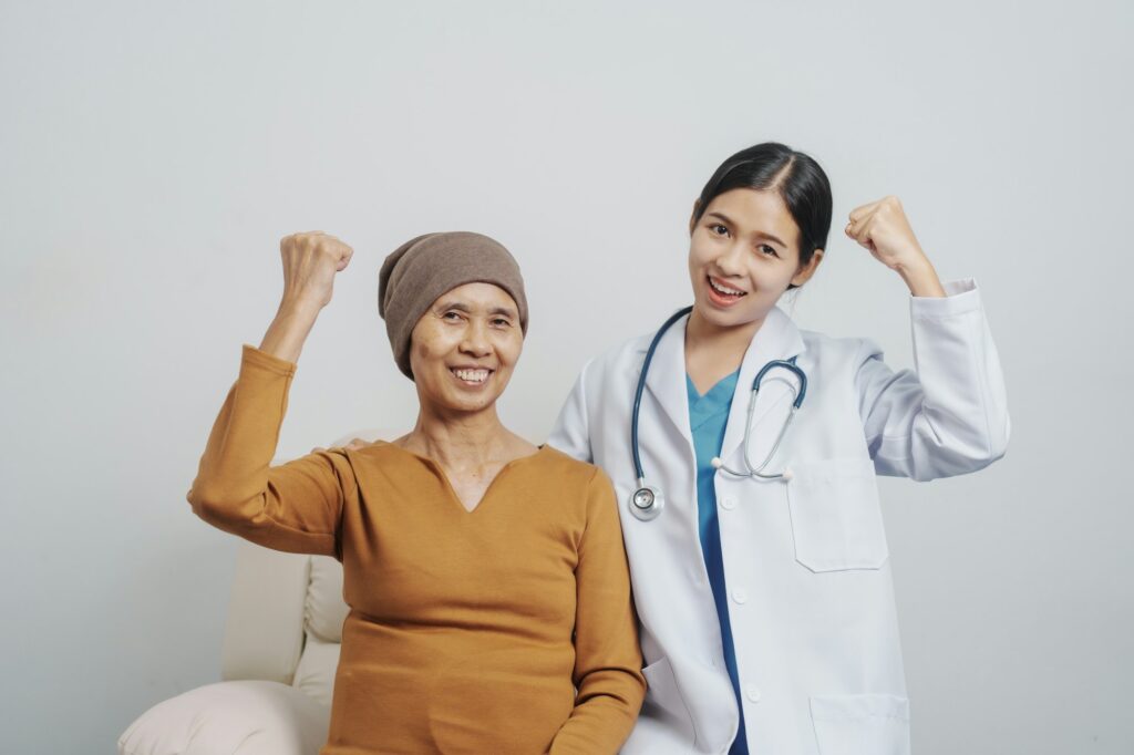 Elderly Asian female patients and cancer specialists meet by appointment to receive treatment advice