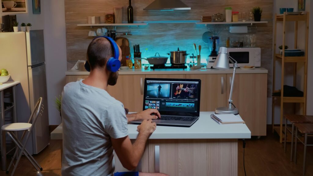 Filmmaker editing video footage using modern technology