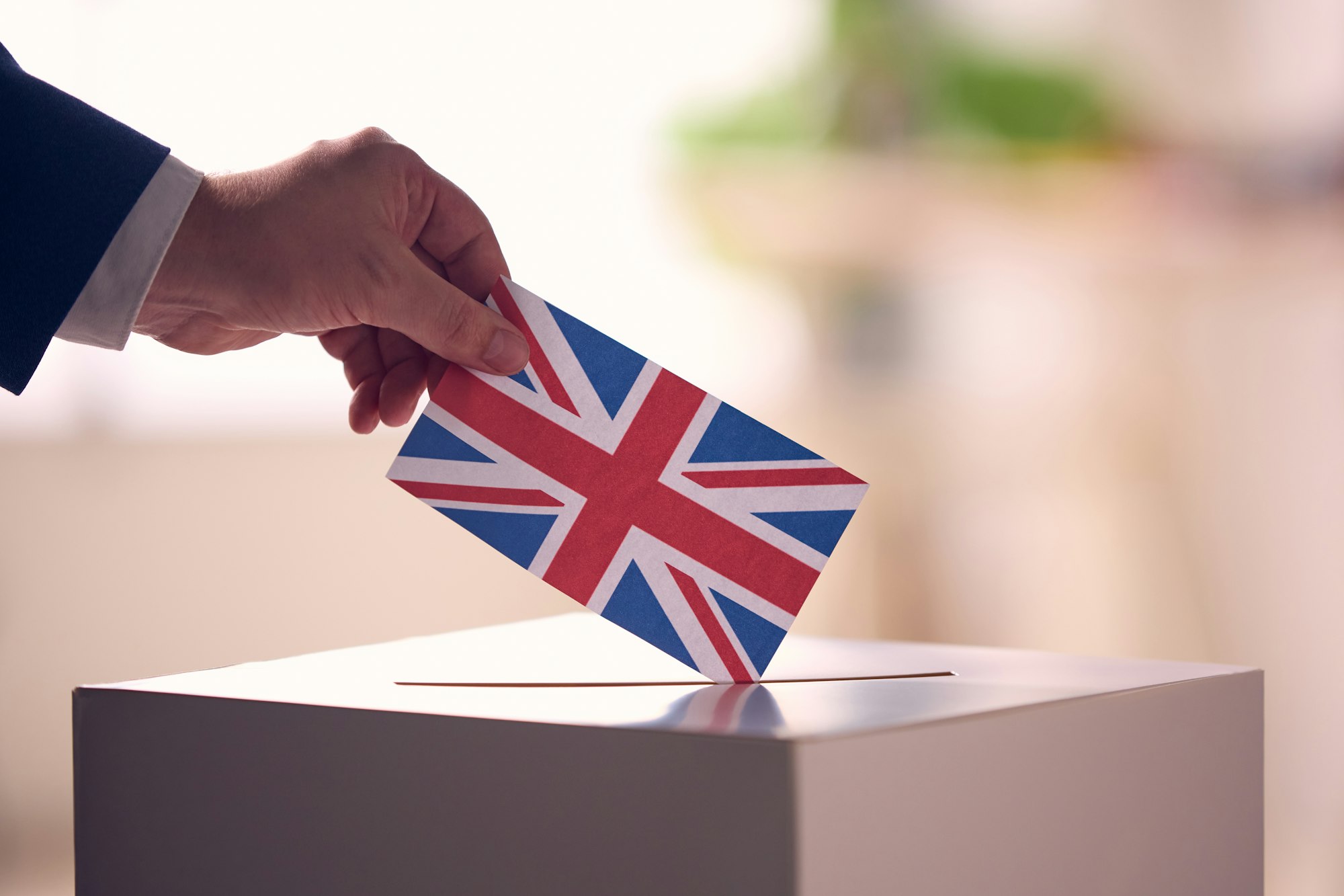 Hand Casting Vote With UK Flag