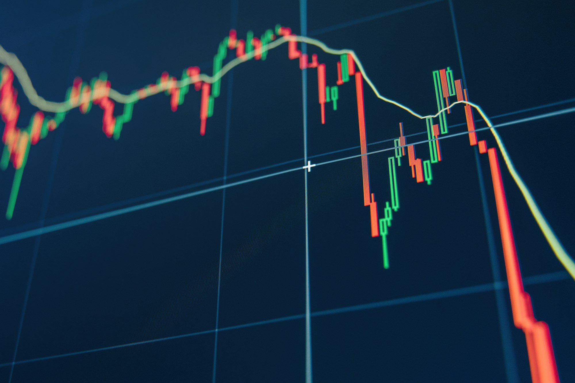 Diagram representing red crashing market volatility of crypto trading on blue display background