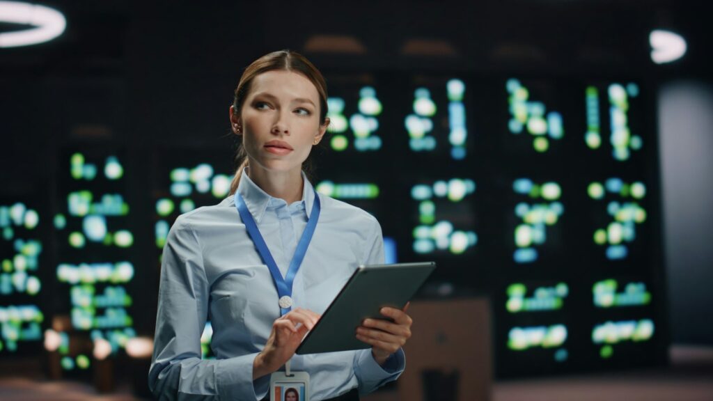 IT specialist lady working tablet computer in data center closeup. Woman at work