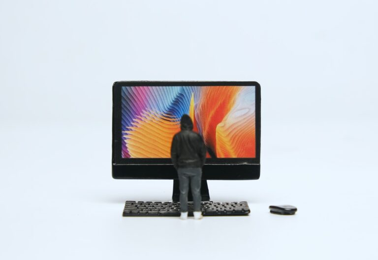 Miniature Men and computer