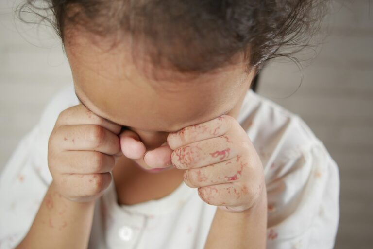 sad upset child girl crying looking down