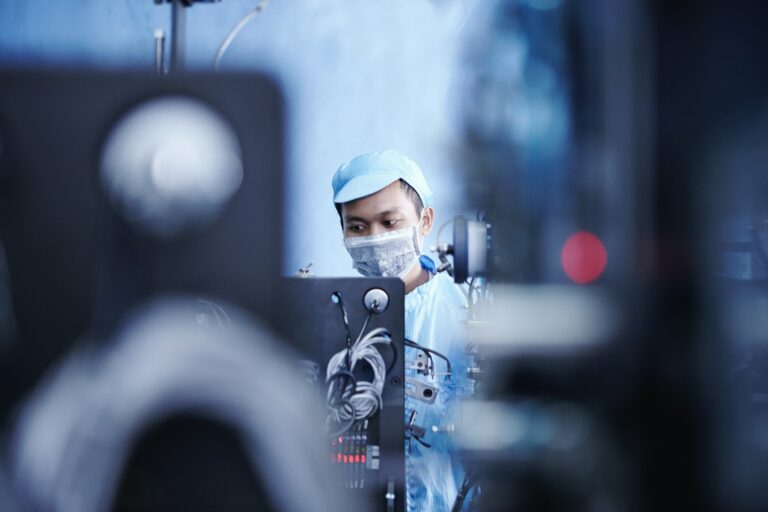 Worker at e-cigarettes battery factory, Guangdong, China