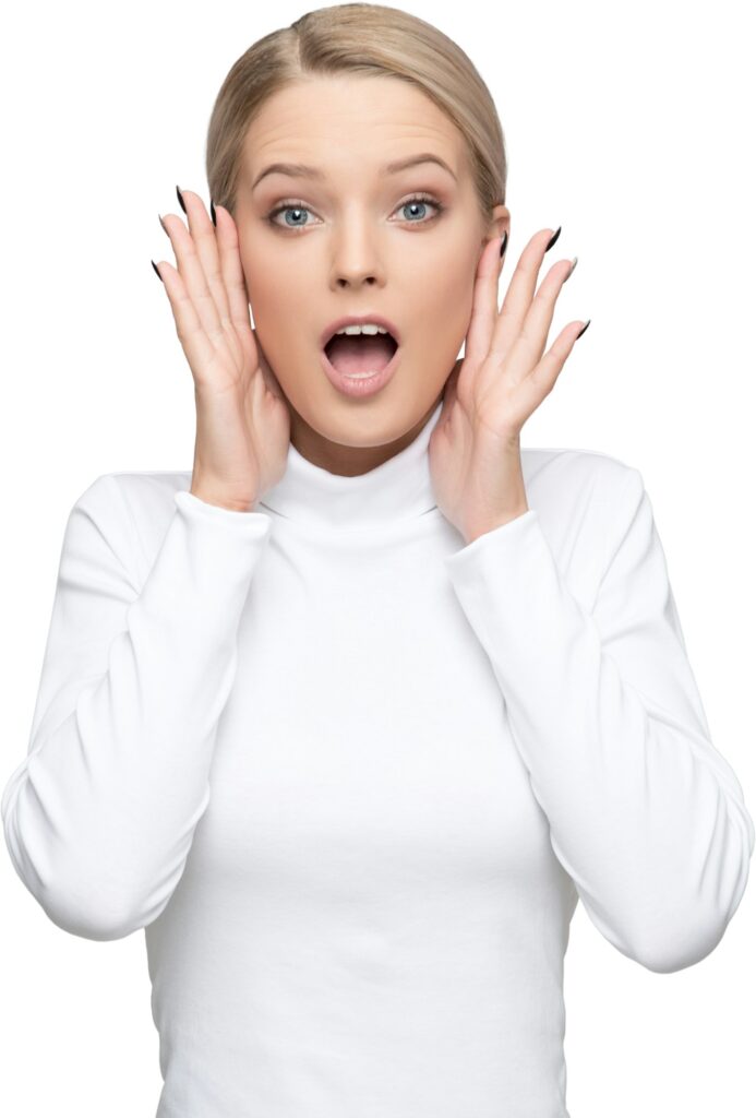 a woman with her hands on her face and a surprised look