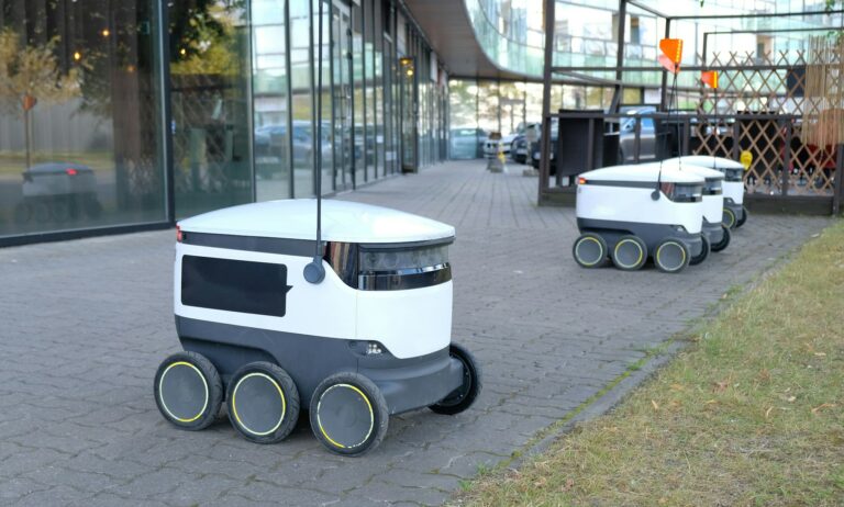 Autonomous delivery robot on street. Estonian company developing autonomous delivery vehic