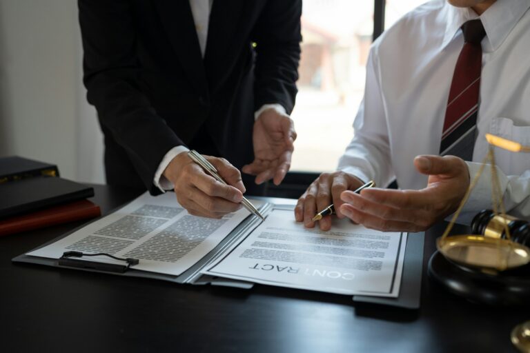 Businessmen and lawyers discuss and explain the contract documents Legal treaty before the signing o