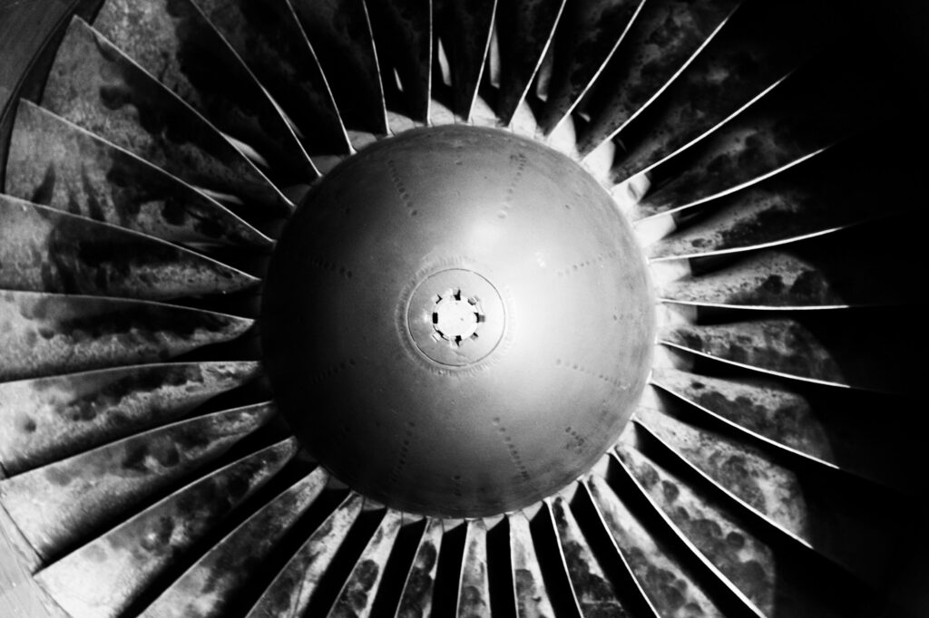 Grayscale closeup of vintage Military Aircraft Jet Engine