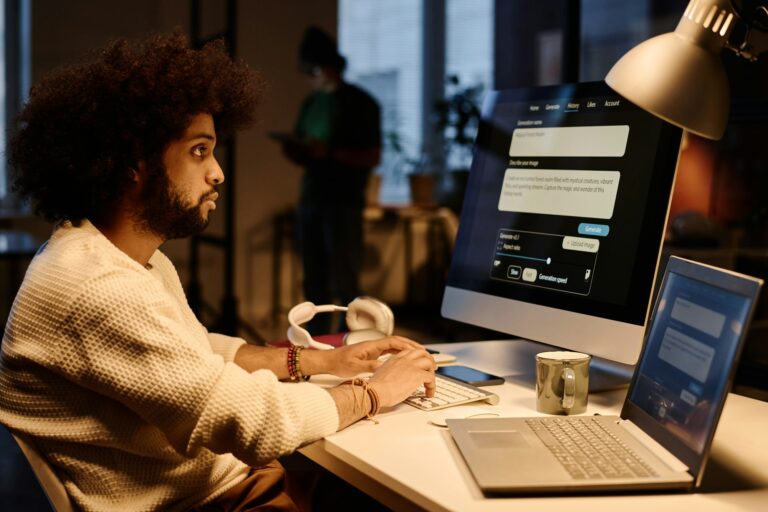 AI specialist looking at computer screen