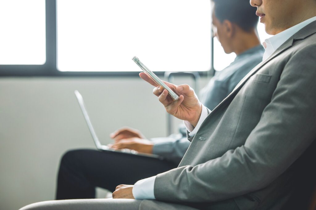 business man with modern people technology concept. two male businessman using laptop computer