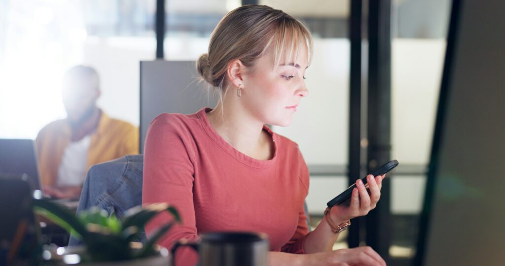 Computer, phone and business woman checking digital information, biometric and authentication in of