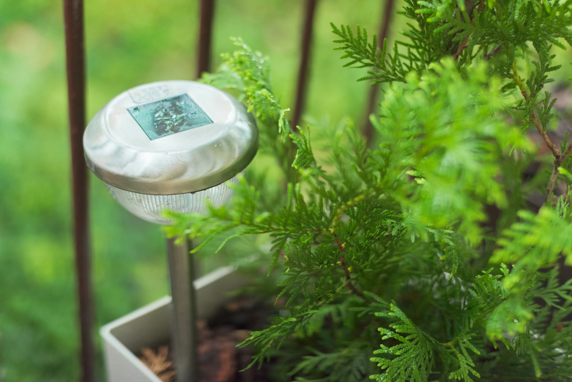 Lamp on the terrace in raindrops, garden lamp solar powered