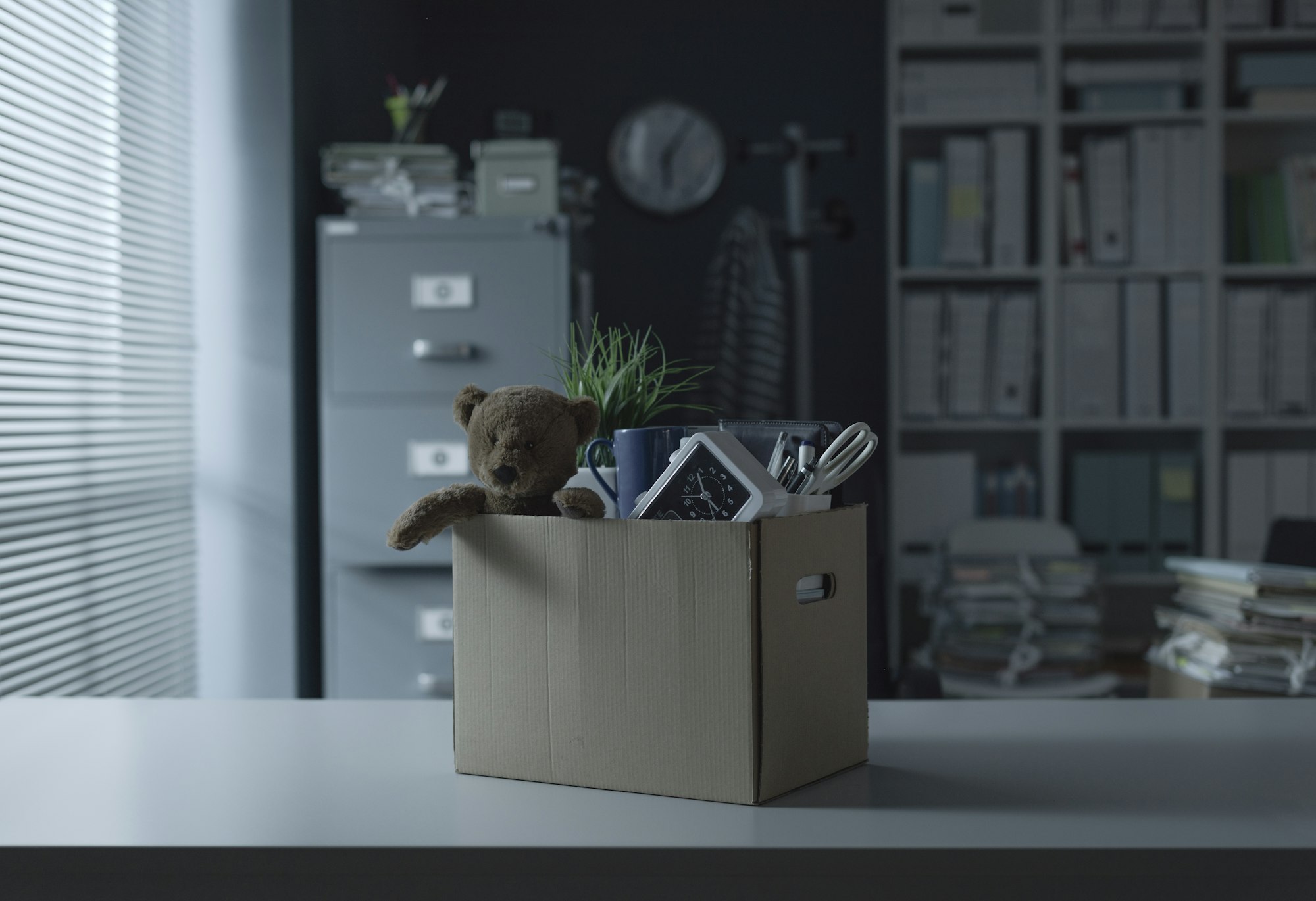 Box filled with personal belongings in the office