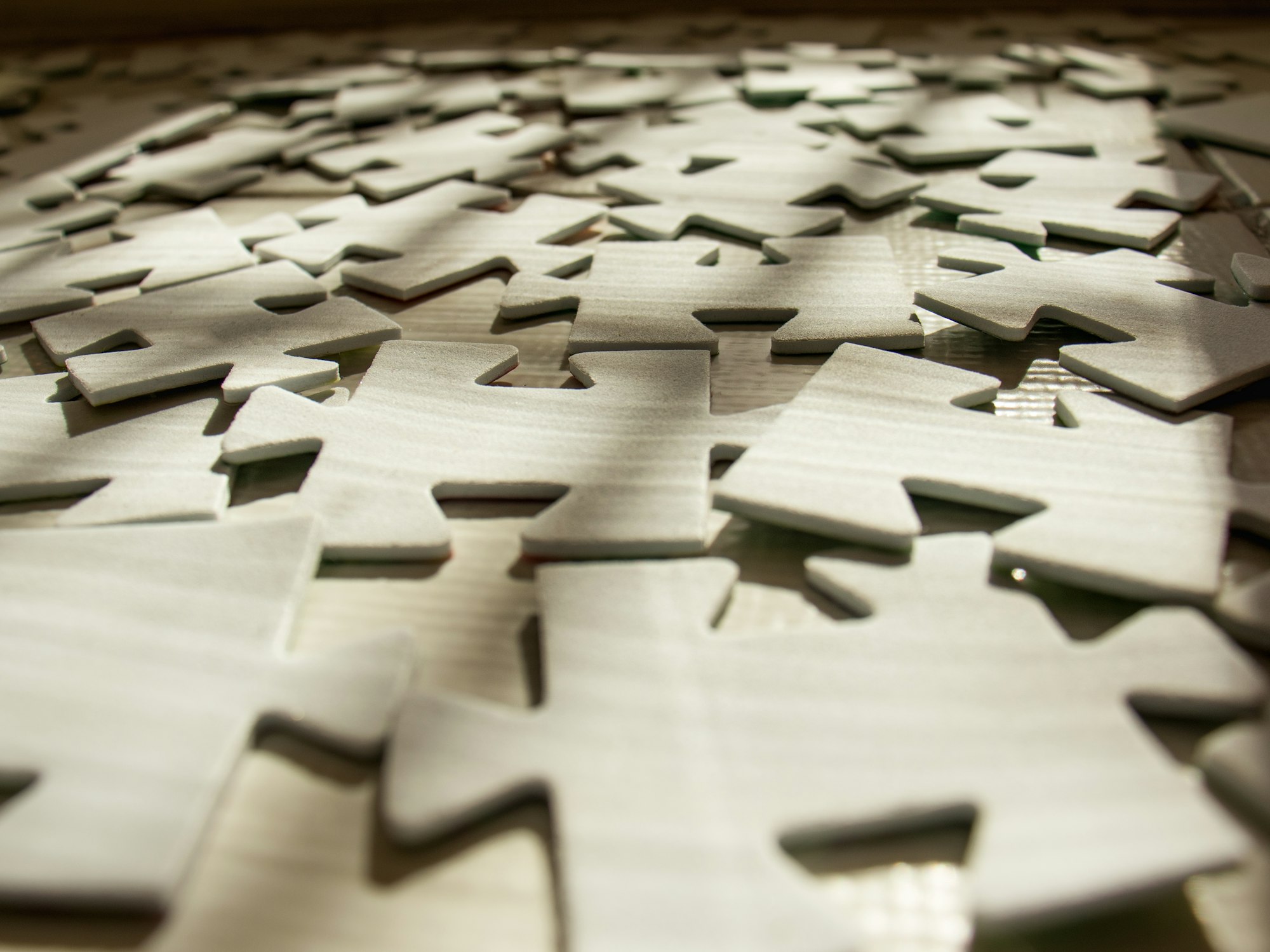 close up puzzles, board games, collect puzzles, puzzle,shadows and light