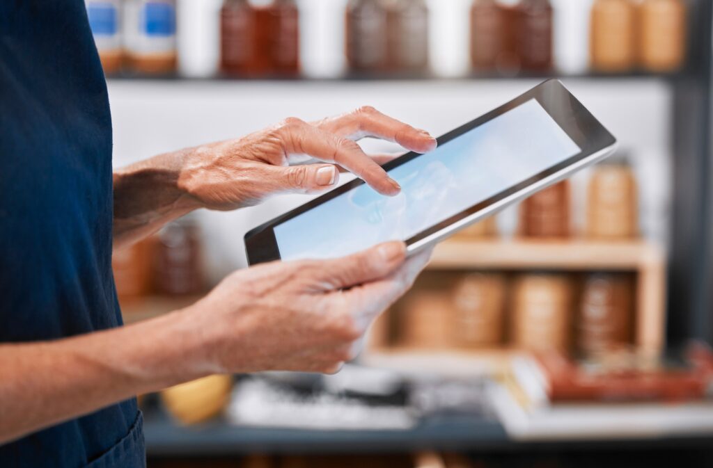 Digital tablet, hands and mockup screen with typing for online research on internet with technology