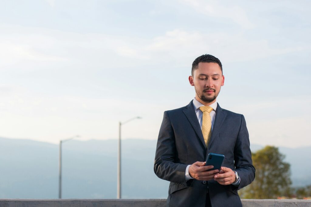 executive using a productivity apps. Coordinating meetings, checking emails, making important calls.