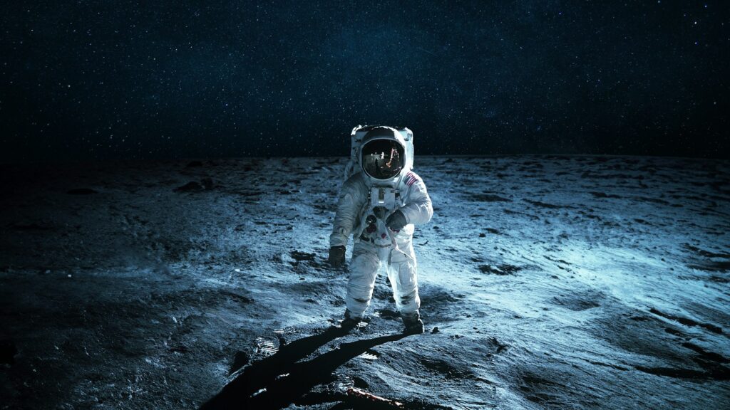 Lonely astronaut walks on the lunar surface. Lunar mission and exploration. Space man