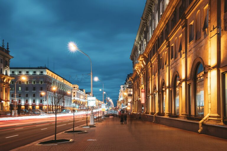 Minsk, Belarus. Traffic On Independence Avenue In Evening Night