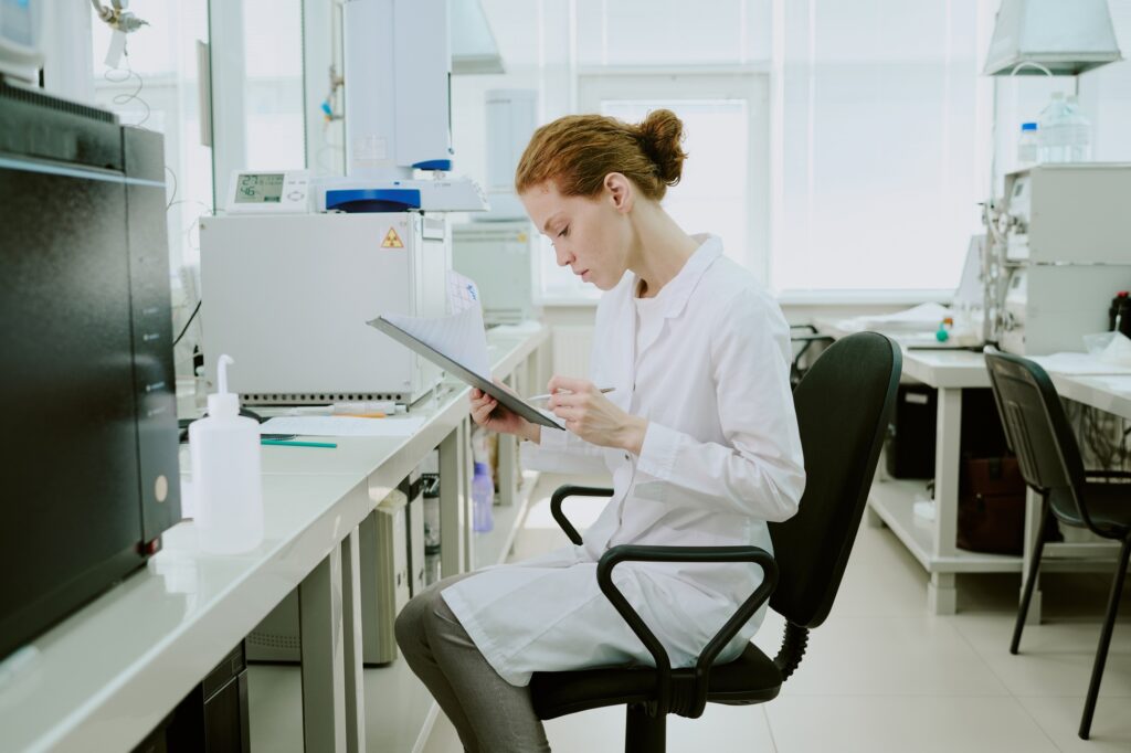 Research Scientist Examining Data in Laboratory