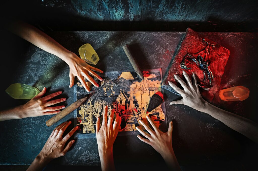 Top view of hands in quest game. Solving a puzzle during riddle.