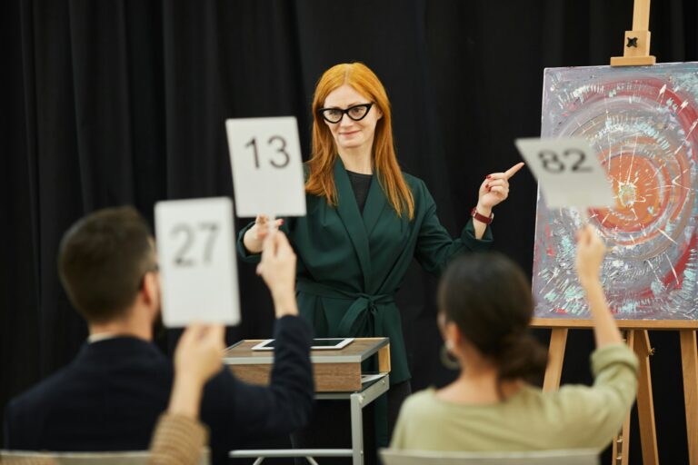 Woman presenting the art at auction