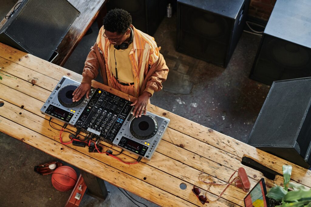 Above view of young African American male musician creating new music