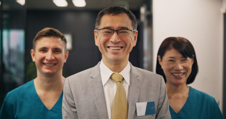 Portrait, doctors and business with Japanese man in hospital for leadership, teamwork and healthcar