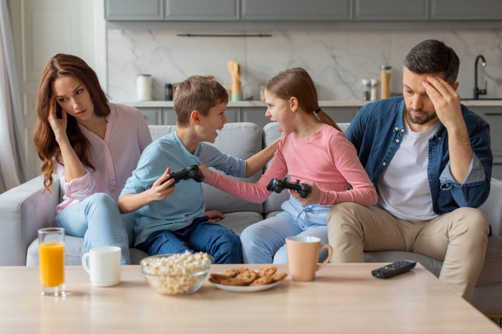 Siblings' disagreement during video game play, home interior