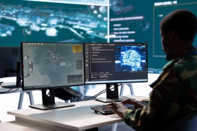 Soldier working with AI intelligence on pc in control room