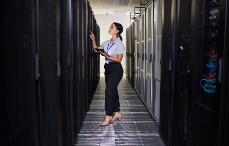 Tablet, woman and engineer in data center for inspection of programming hardware. Information techn