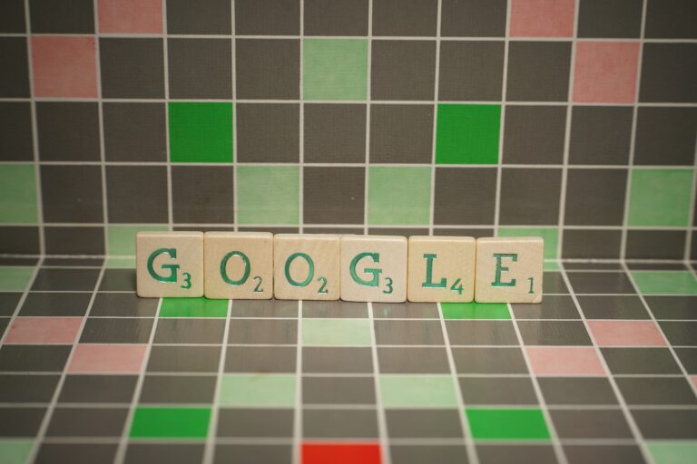 Tile with green google text on a blocked background