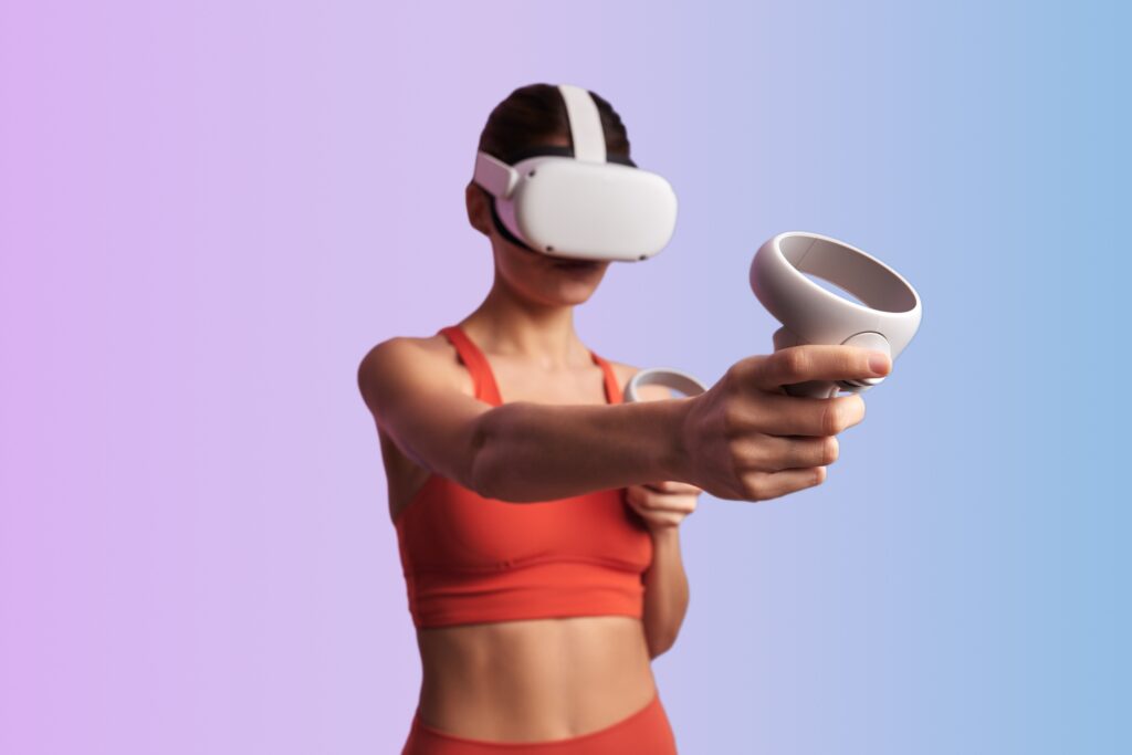 Woman in VR headset playing videogame