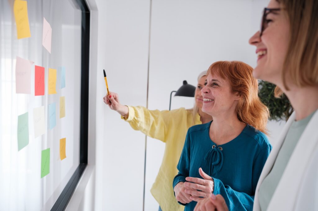 Group of businesswomen of different ages generating a business opportunity.