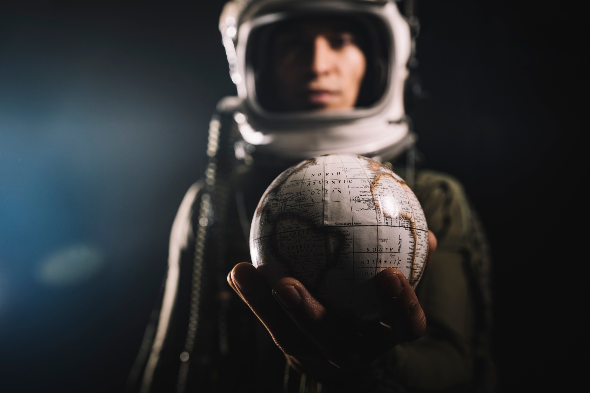 Man posing dressed as an astronaut in skyrocket elevator