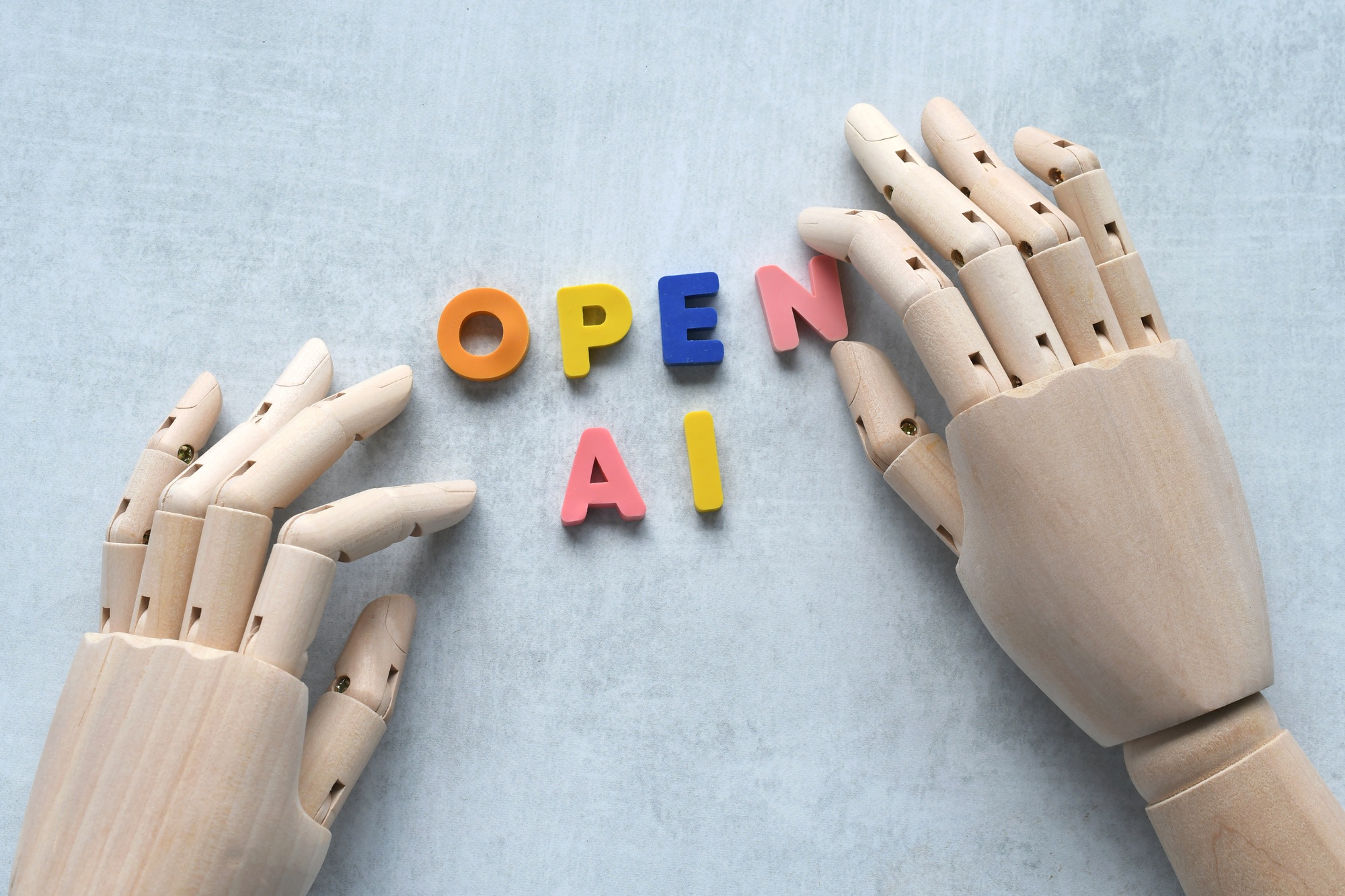 🔓OpenAI Releases New GPT‑OSS: The Return of Open-Weighted Models ai artificial intelligence concept robot hand spelling out open ai