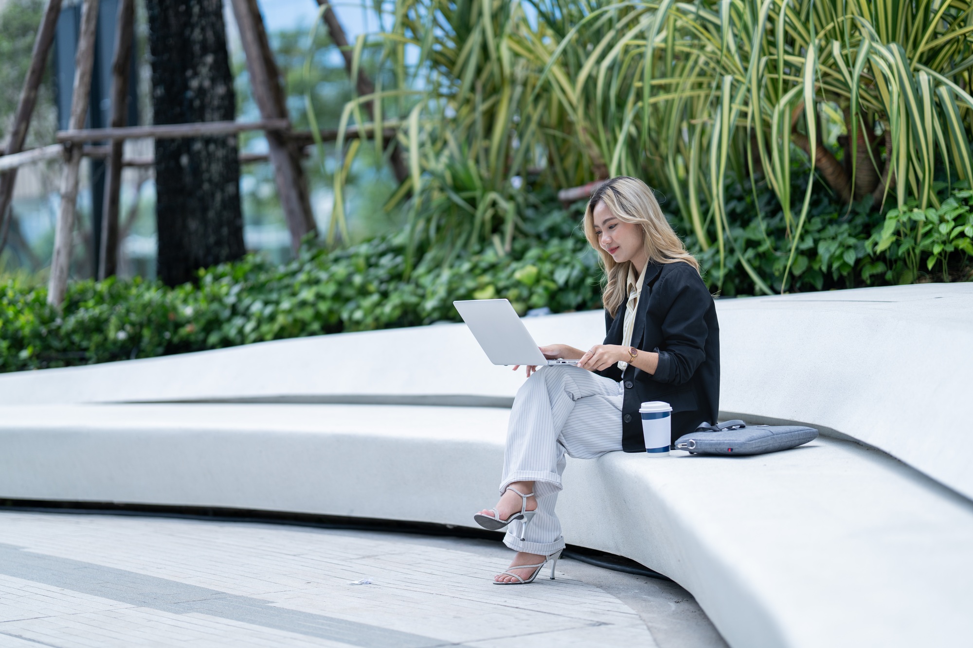 asian business woman is working in public space. dailylife activity.