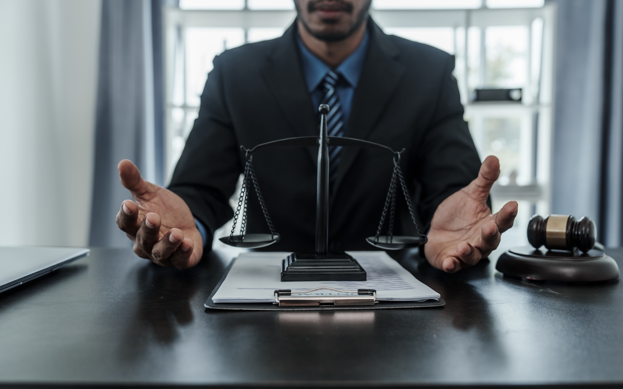 portrait of successful mixed race asian indian chinese handsome businessman lawyer closes the deal