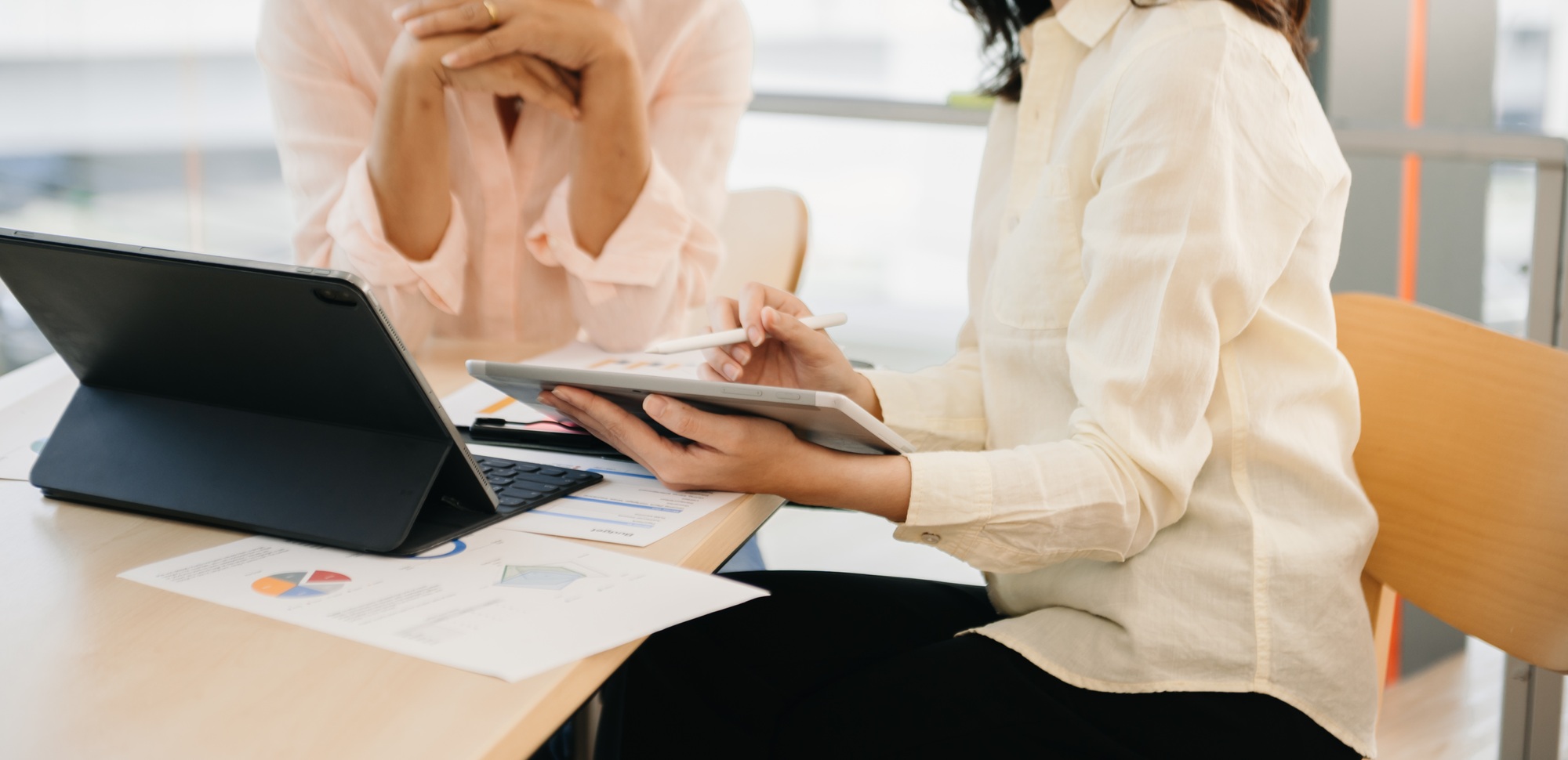 team business coworkers working on mobile laptop computer at office.young woman holding tablet