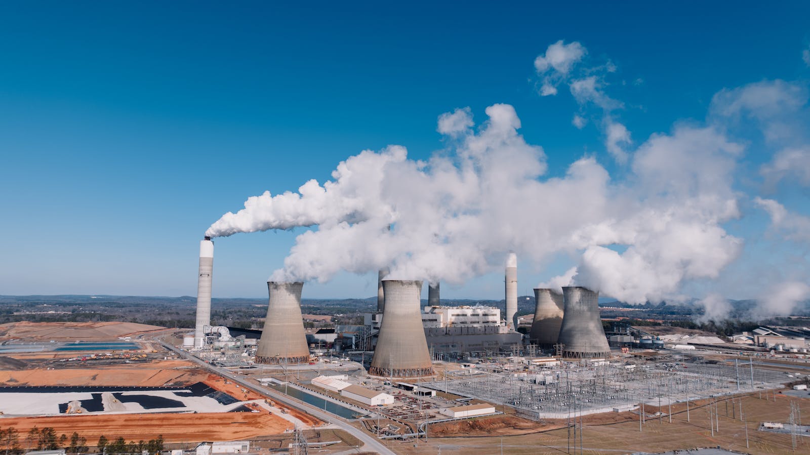 Aerial shot of an industrial power plant with smoke billowing in Euharlee, Georgia.