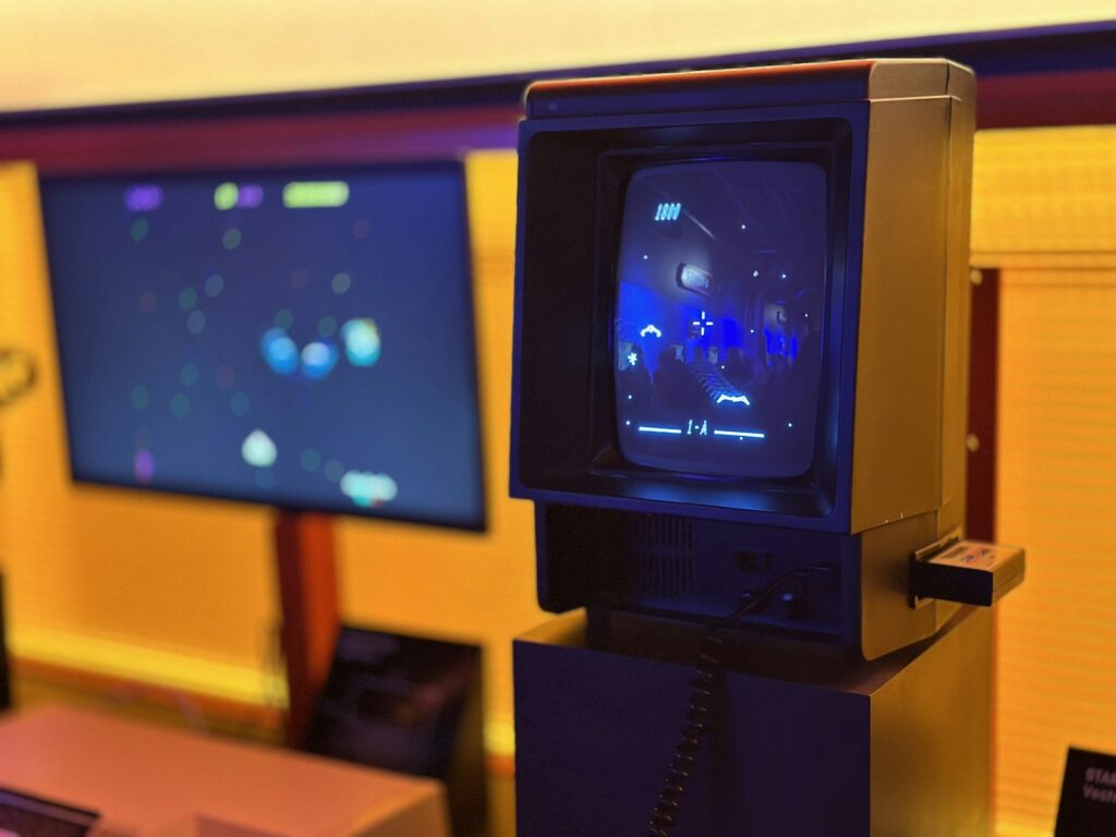 The New Race to Your Mind a small tv sitting on top of a wooden stand