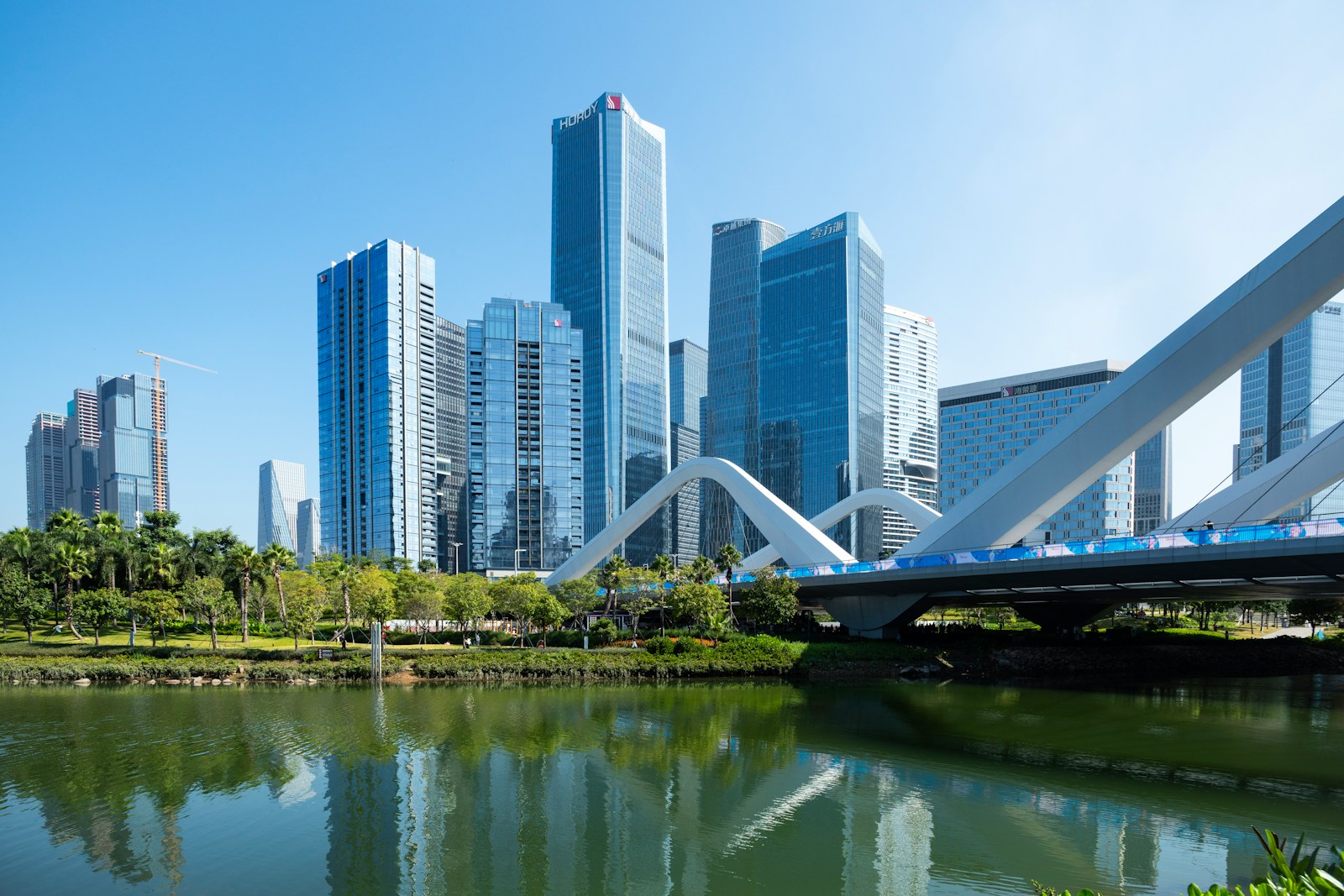 Modern cityscape with a bridge over water