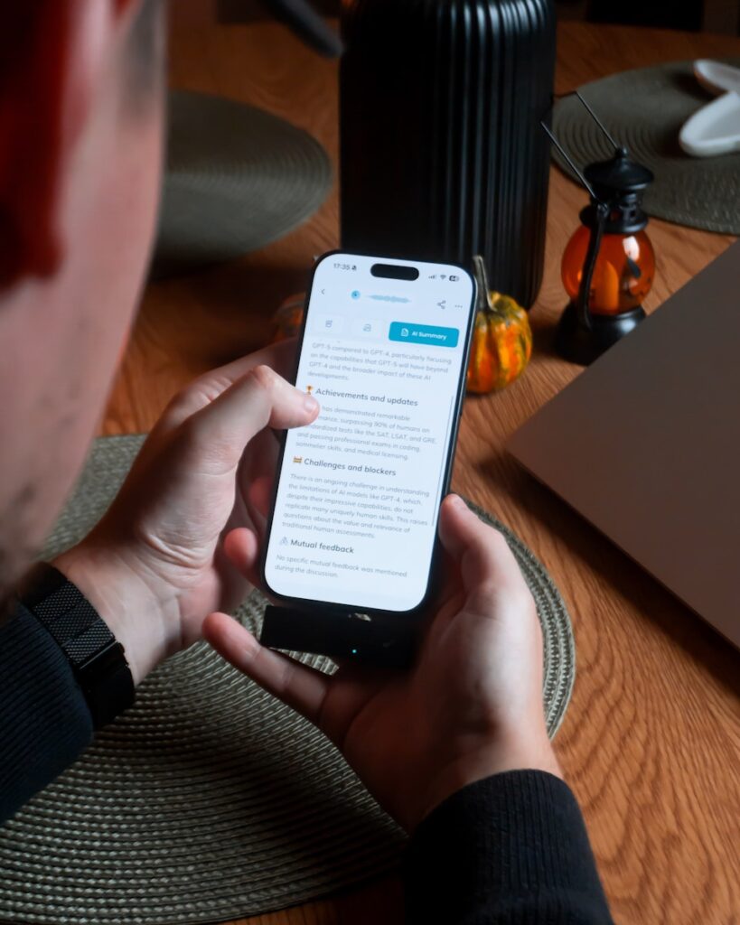 Person holding smartphone with text on screen