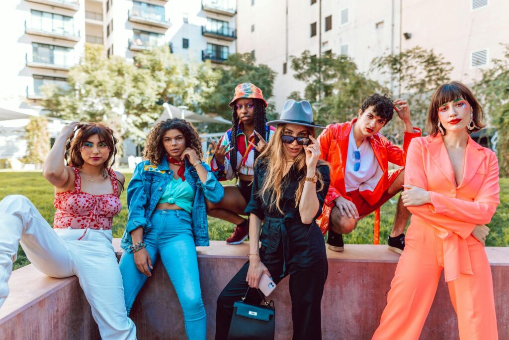 Why 2025 Proved New AI Powerful but Not Life-Changing A diverse group of stylish young adults posing together in an urban outdoor setting.