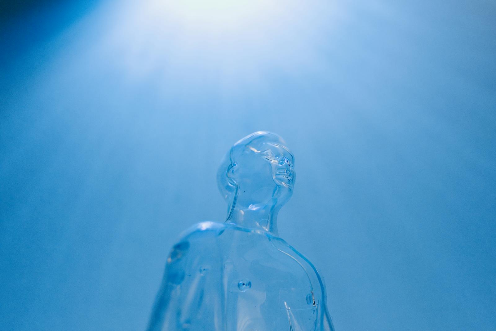 The AI Architects Who Are Quietly Rewriting the New World Transparent figure against a blue sky, symbolizing futuristic concepts and technology.